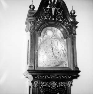 Face of grandfather clock on north wall