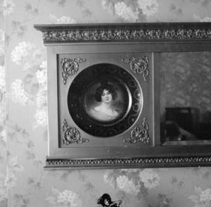 Left portrait of mirror over